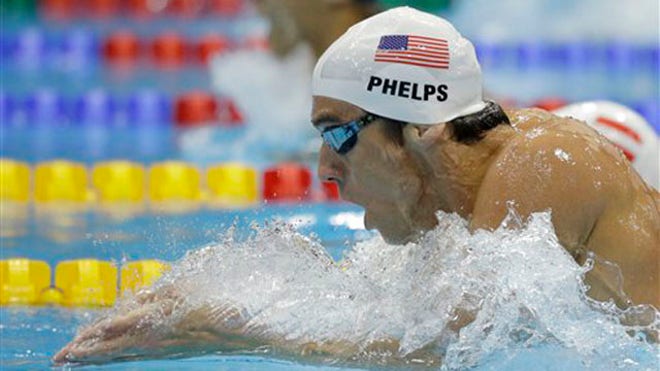 PHELPS WINS MEDALS.jpg
